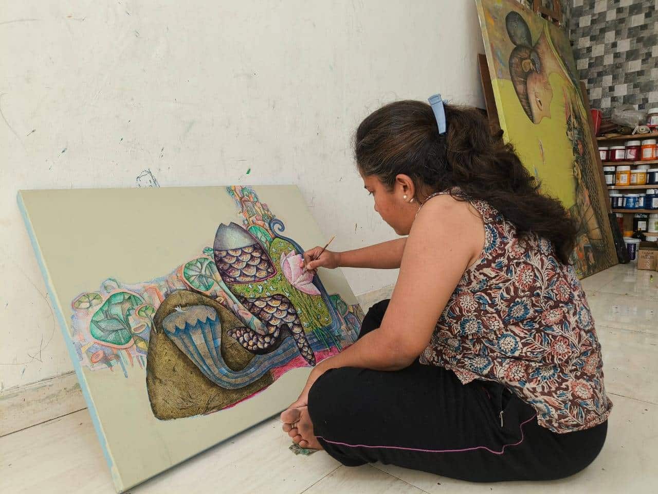 The studio: Where pigments dance and forms collide, birthing the unseen.