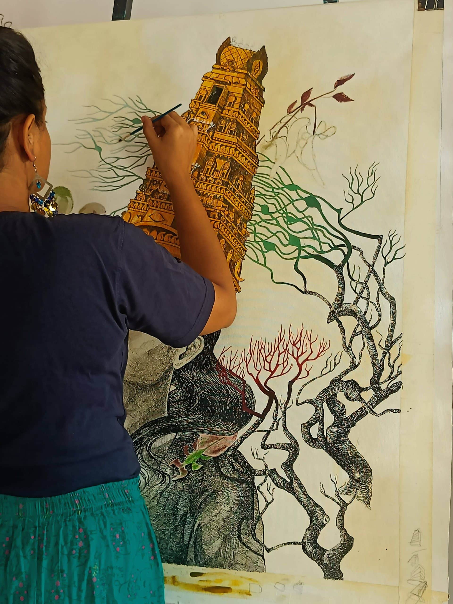 The delicate dance of brush and ink as a world takes shape